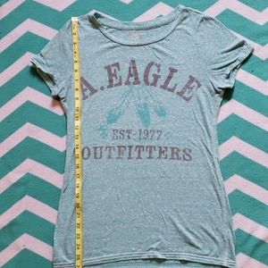 American Eagle Turquoise Tee Shirt with Feathers